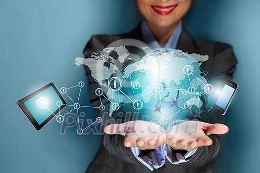 Close up image of businesswoman with 3d images of devices in her hands