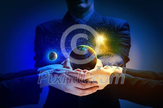 Close up image of human hands holding earth planer. Ecology concept Close up image of human hands holding earth planer. Ecology concept