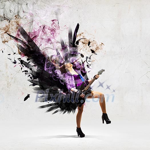 Young attractive rock girl playing the electric guitar Young attractive rock girl playing the electric guitar