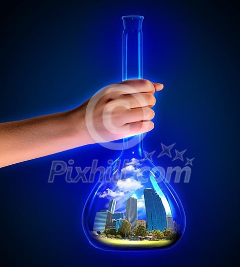 Close up of human hand holding test tube. Ecology concept Close up of human hand holding test tube. Ecology concept
