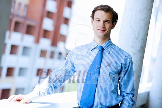 Image of young handsome confident businessman in suit Image of young handsome confident businessman in suit