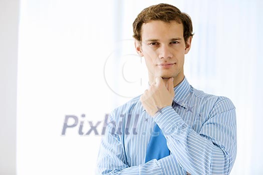 Image of young handsome confident businessman in suit Image of young handsome confident businessman in suit