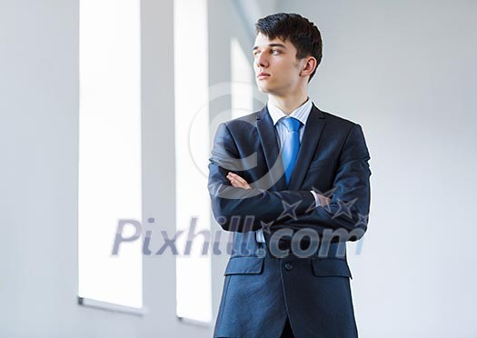 Image of handsome confident businessman in business suit Image of handsome confident businessman in business suit