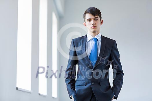 Image of handsome confident businessman in business suit Image of handsome confident businessman in business suit