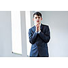 Image of handsome confident businessman in business suit