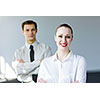Young happy businesswoman with colleague. Leadership concept