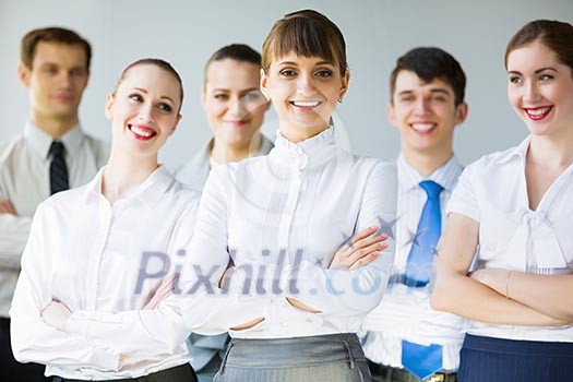 Young business people standing with arms crossed on chest Young business people standing with arms crossed on chest