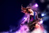 Young attractive rock girl playing the electric guitar