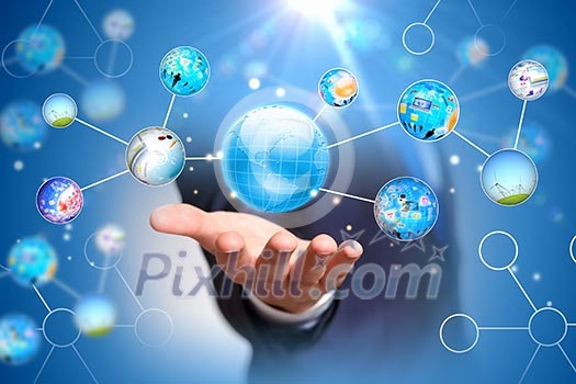 Close up of human hand holding globe image Close up of human hand holding globe image