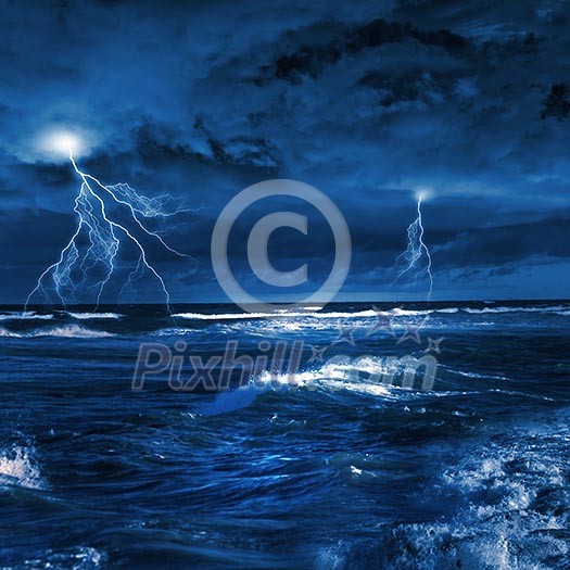 Image of night stormy sea with big waves and lightning