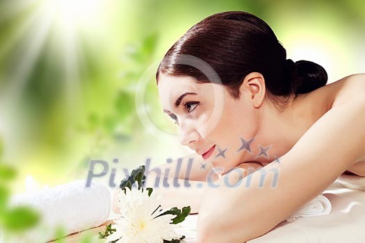 Young pretty woman with clear skin at spa salon getting massage Young pretty woman with clear skin at spa salon getting massage