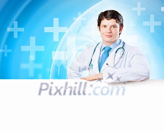 Image of handsome doctor holding white blank banner Image of handsome doctor holding white blank banner
