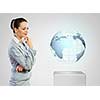 Image of thoughtful businesswoman looking at globe