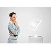 Image of businesswoman and white tablet pc. New technologies