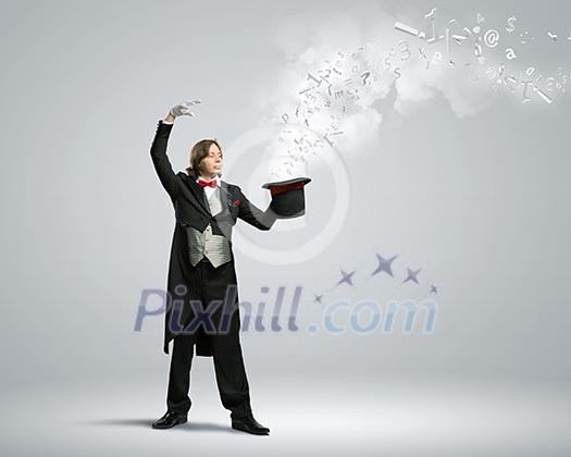Image of magician holding hat with lights and fumes going out Image of magician holding hat with lights and fumes going out