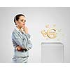 Image of thoughtful businesswoman with euro symbol. Currency concept