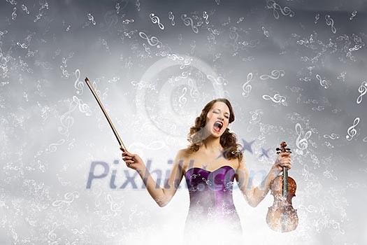 Image of young singing woman holding violin Image of young singing woman holding violin