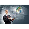 Image of businessman with tablet pc. Elements of this image are furnished by NASA