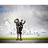 Image of two businesswomen looking into distance standing back to back