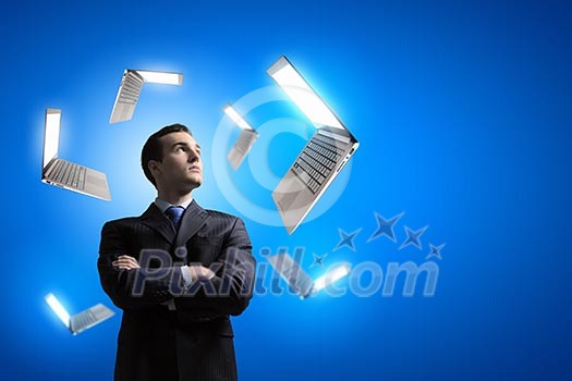 Image of confident businessman with arms crossed on chest Image of confident businessman with arms crossed on chest