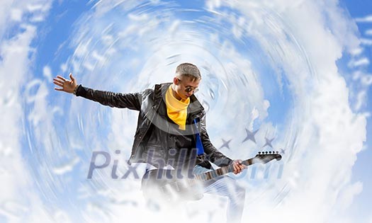 Young man, rock musician in jacket with guitar Young man, rock musician in jacket with guitar