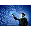Image of businessman pressing icon of media screen. Innovations
