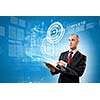 Image of businessman with tablet pc against media background