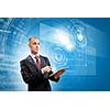 Image of businessman with tablet pc against media background