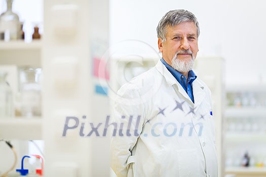 Senior male researcher carrying out scientific research in a lab (shallow DOF; color toned image) Senior male researcher carrying out scientific research in a lab (shallow DOF; color toned image)