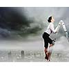 Image of young ambitious businesswoman climbing ladder. Promotion concept