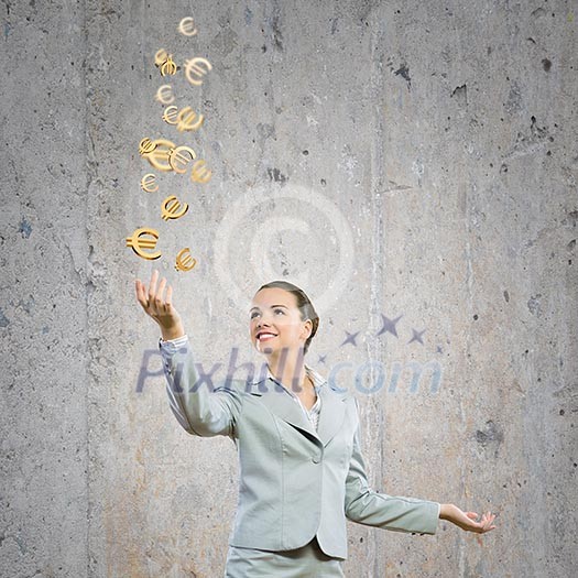 Image of young happy businesswoman. Currency concept Image of young happy businesswoman. Currency concept