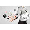 Close-up image of businesswoman throwing dices. Gambling concept