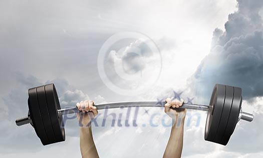 Lifting barbell above head. Strength and power Lifting barbell above head. Strength and power