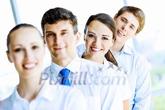 Image of young business people standing in line. Interaction concept Image of young business people standing in line. Interaction concept