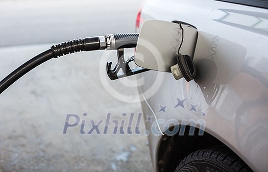 Car fueling at the gas station Car fueling at the gas station
