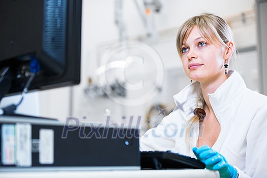 Portrait of a female researcher carrying out research in a chemistry lab (color toned image; shallow DOF) Portrait of a female researcher carrying out research in a chemistry lab (color toned image; shallow DOF)