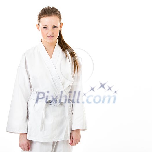 Beautiful caucasian, young, woman in karate kimono on white background Beautiful caucasian, young, woman in karate kimono on white background