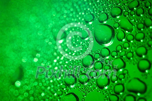 Refreshing green watery background (color toned image; shallow DOF) Refreshing green watery background (color toned image; shallow DOF)