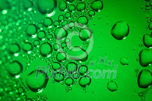 Refreshing green watery background (color toned image; shallow DOF) Refreshing green watery background (color toned image; shallow DOF)