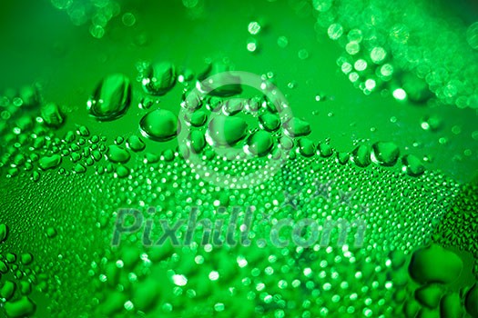 Refreshing green watery background (color toned image; shallow DOF) Refreshing green watery background (color toned image; shallow DOF)