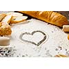 White bread and flour on kitchen table