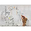 Close up of human hand drawing conceptual sketches
