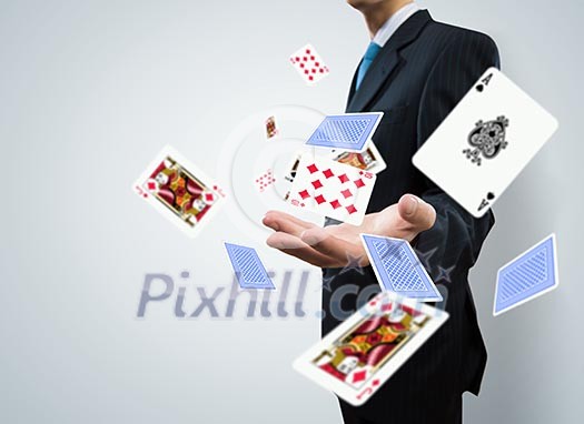 Close up of businessman throwing cards. Gambling concept Close up of businessman throwing cards. Gambling concept