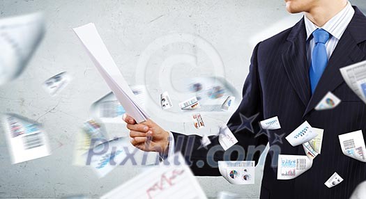 Close up of businessman with papers in hands Close up of businessman with papers in hands