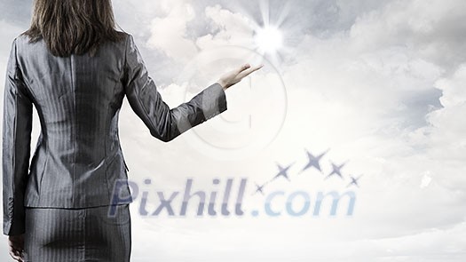 Back view of businesswoman against nature background Back view of businesswoman against nature background