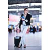 Pretty young female passenger at the airport (shallow DOF; color toned image)