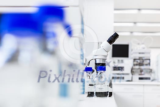 chemistry lab (shallow DOF; focus on the beakers in the foreground) chemistry lab (shallow DOF; focus on the beakers in the foreground)
