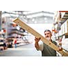 Senior man buying construction wood in a  DIY store