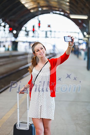 Pretty young woman at a train station Pretty young woman at a train station