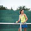 pretty, young female tennis player on the tennis court (shallow DOF, selective focus)